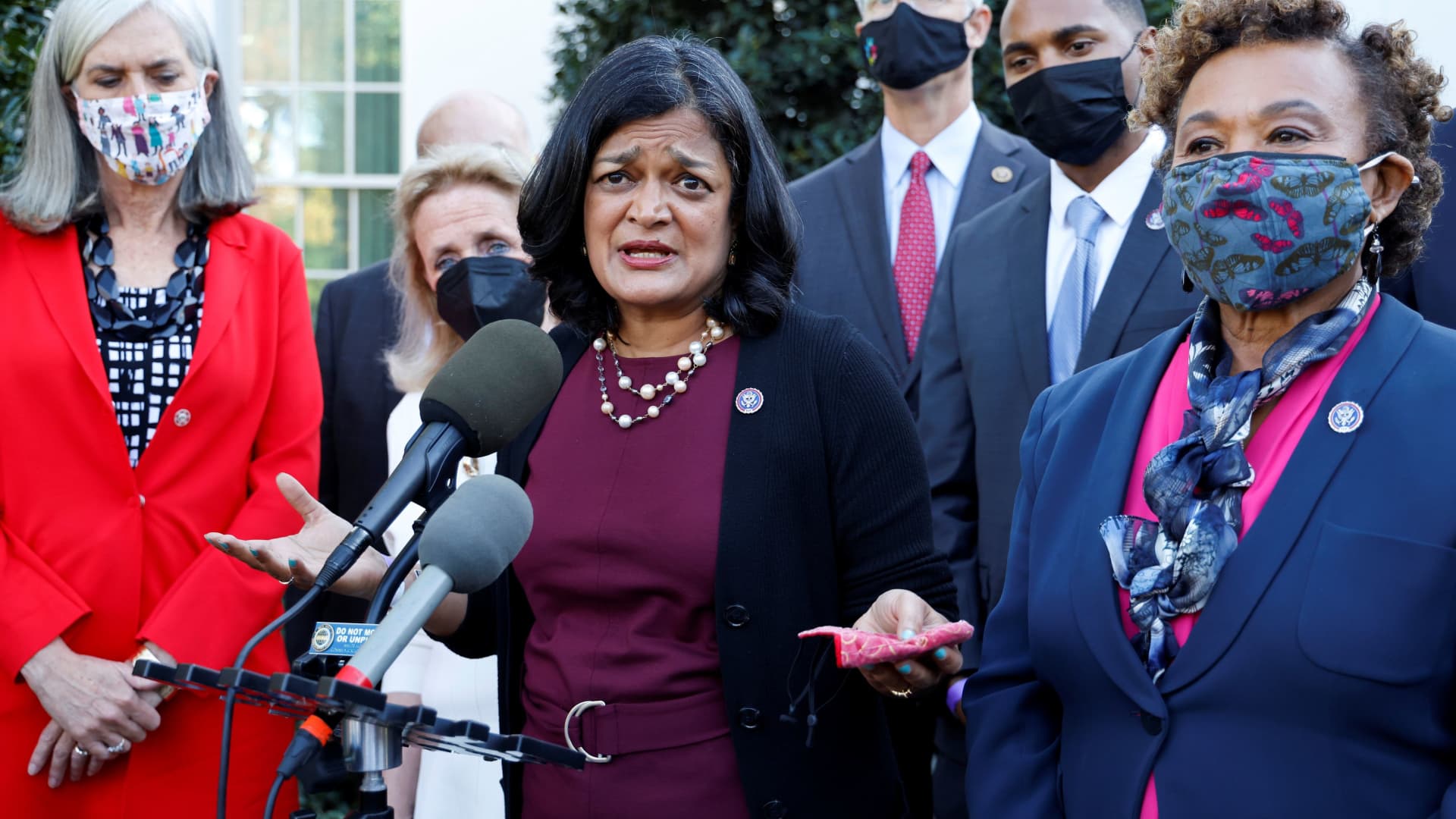 U.S. Representative Pramila Jayapal (D-WA), with Rep. Katherine Clark (D-MA), Rep. Debbie Dingell (D-MI), Rep. Jared Huffman (D-CA), Rep. Ritchie Torres (D-NY) and Rep. Barbara Lee (D-CA), leads a group of Democratic members of Congress out of the West Wing to speak to reporters after meeting with President Joe Biden about infrastructure legislation at the White House in Washington, October 19, 2021.