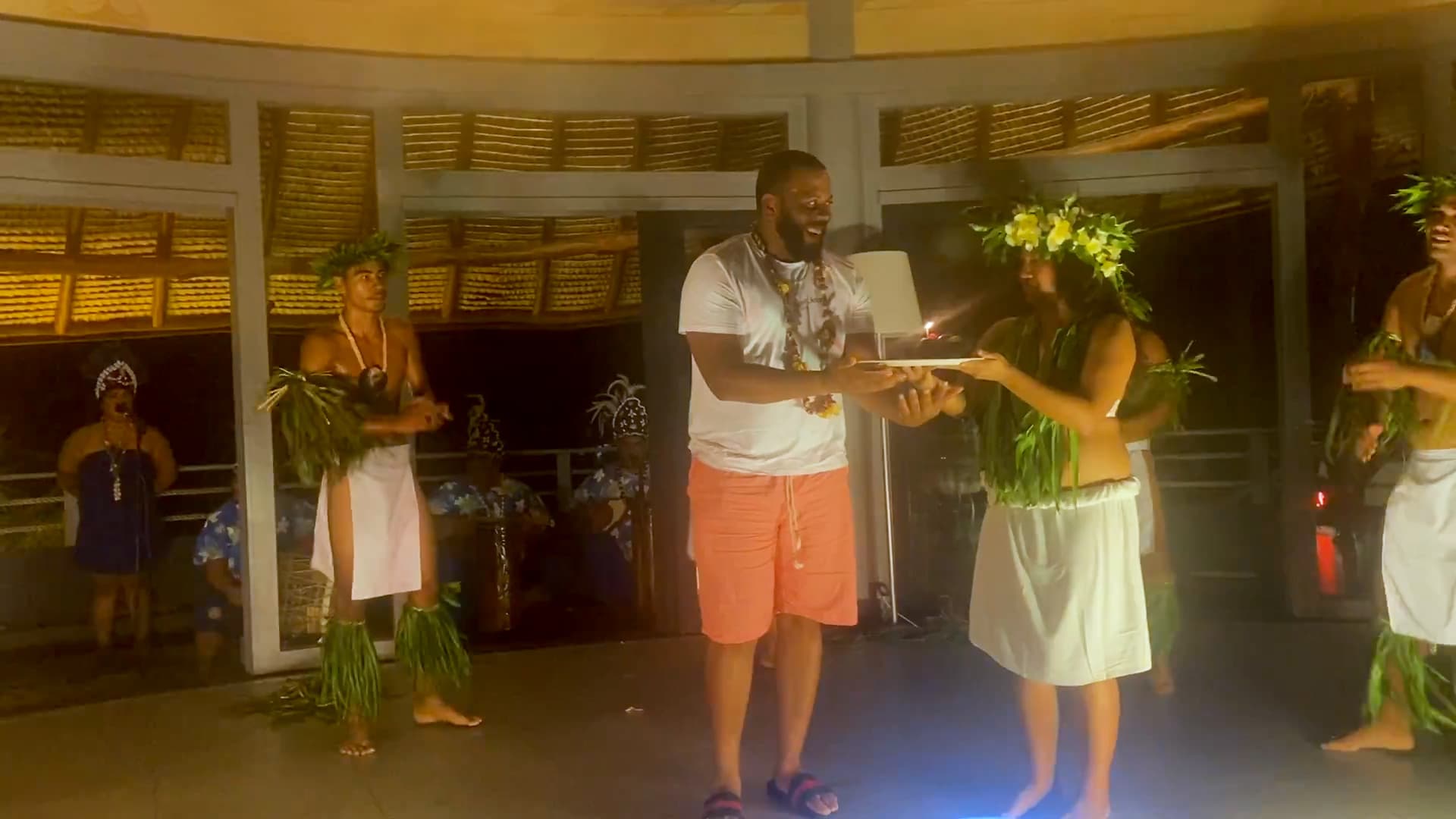 Alston surprises Gales for his birthday by having him brought on stage during the Polynesian celebration.