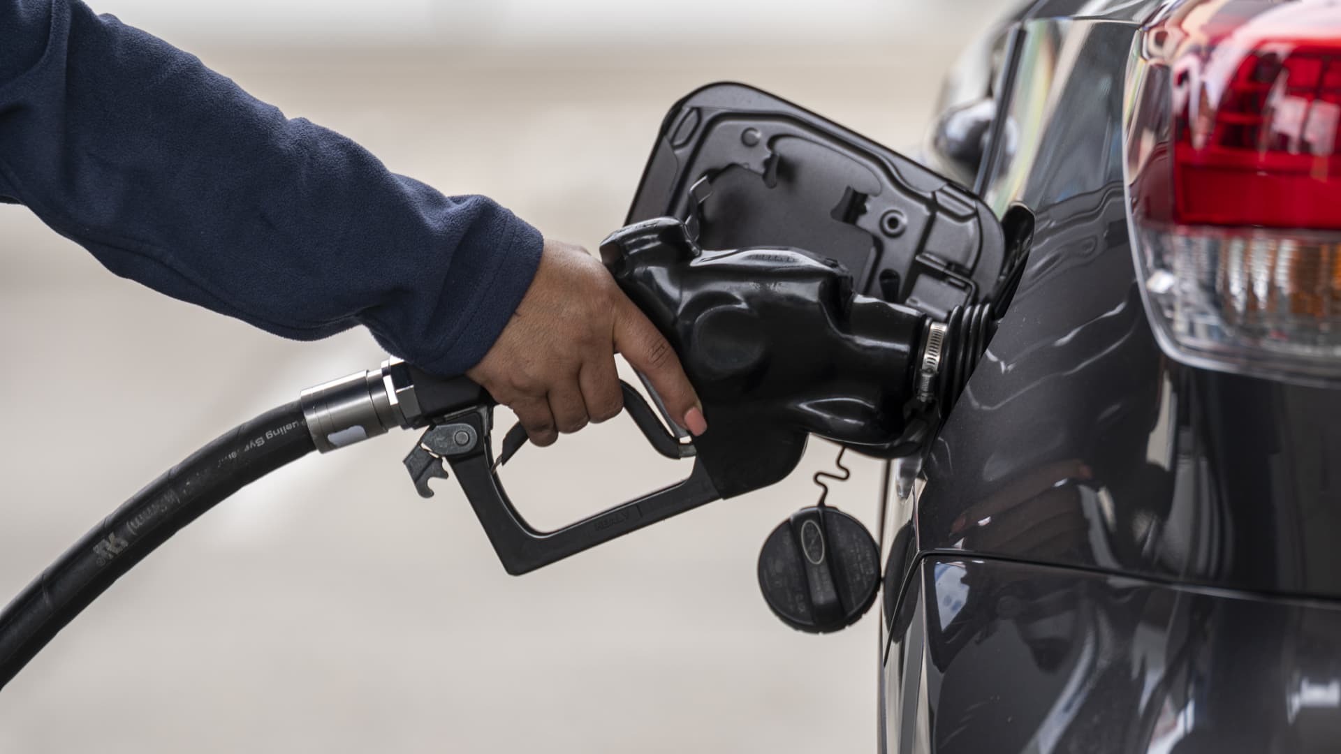 A customer refuels a car at a gas station in San Francisco, California, U.S., on Thursday, Oct. 21, 2021.