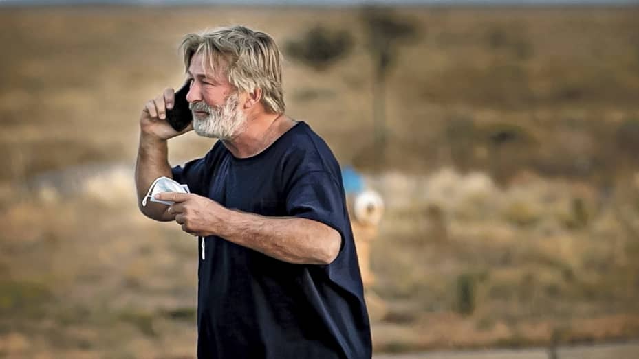 Alec Baldwin speaks on the phone in the parking lot outside the Santa Fe County Sheriff's Office in Santa Fe, N.M., after he was questioned about a shooting on the set of the film "Rust" on the outskirts of Santa Fe, Thursday, Oct. 21, 2021. Baldwin fired