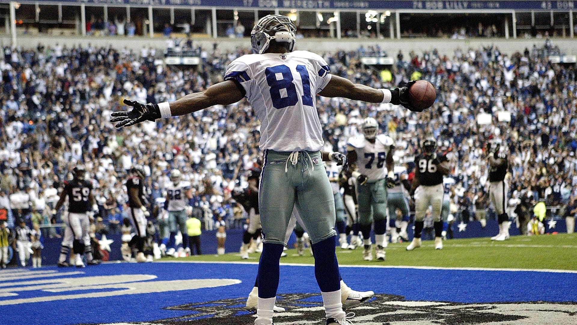 Wide receiver Terrell Owens #81 of the Dallas Cowboys celebrates his third touchdown against the Houston Texans on October 15, 2006 at Texas Stadium in Irving, Texas. The Cowboys defeated the Texans 34-6.