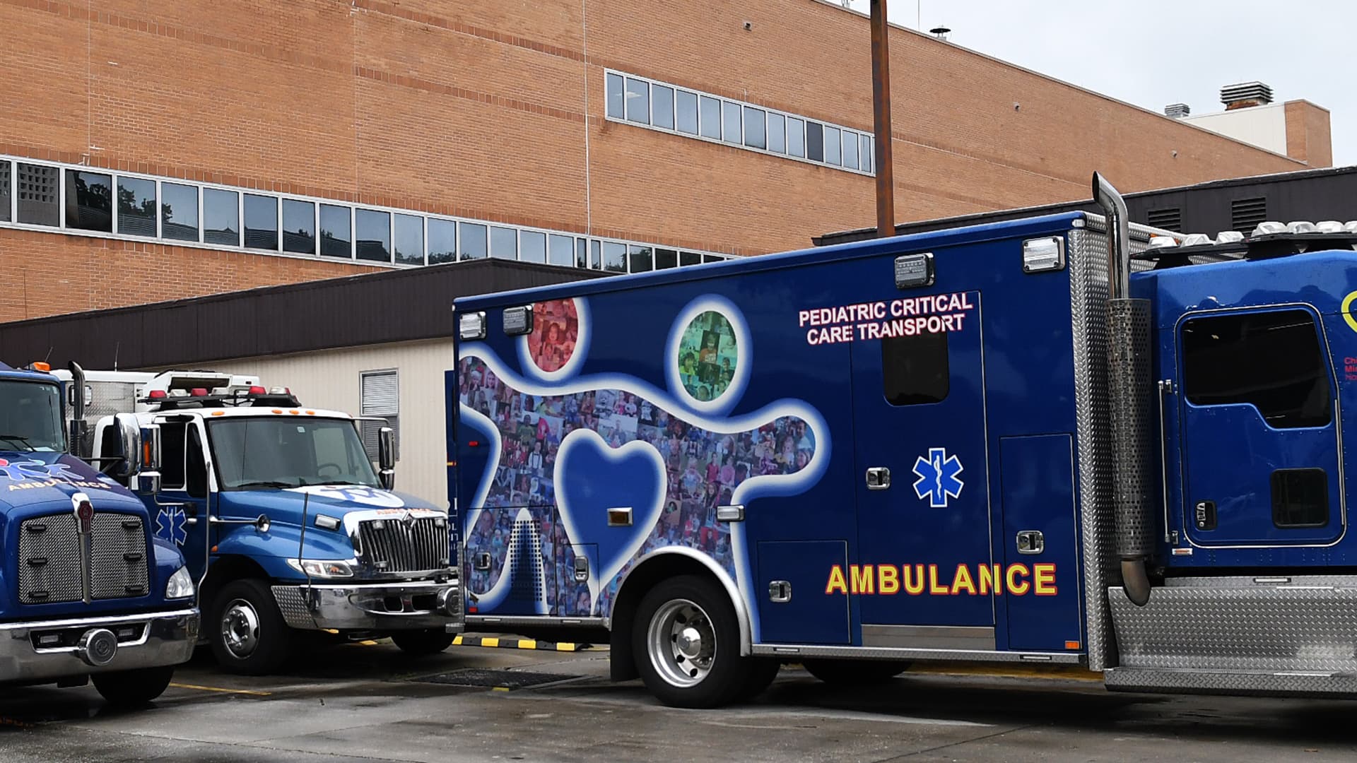 Ambulances are seen at the emergency entrance at Arnold Palmer Hospital for Children. The number of children hospitalized with COVID-19 in the United States hit a record high of just over 1900, with Florida leading the country in hospitalized children as school classes began this week.