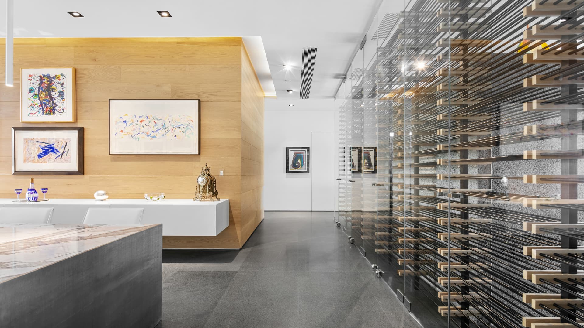 The dining area's floor-to-ceiling wine storage has a 1,200 bottle capacity.