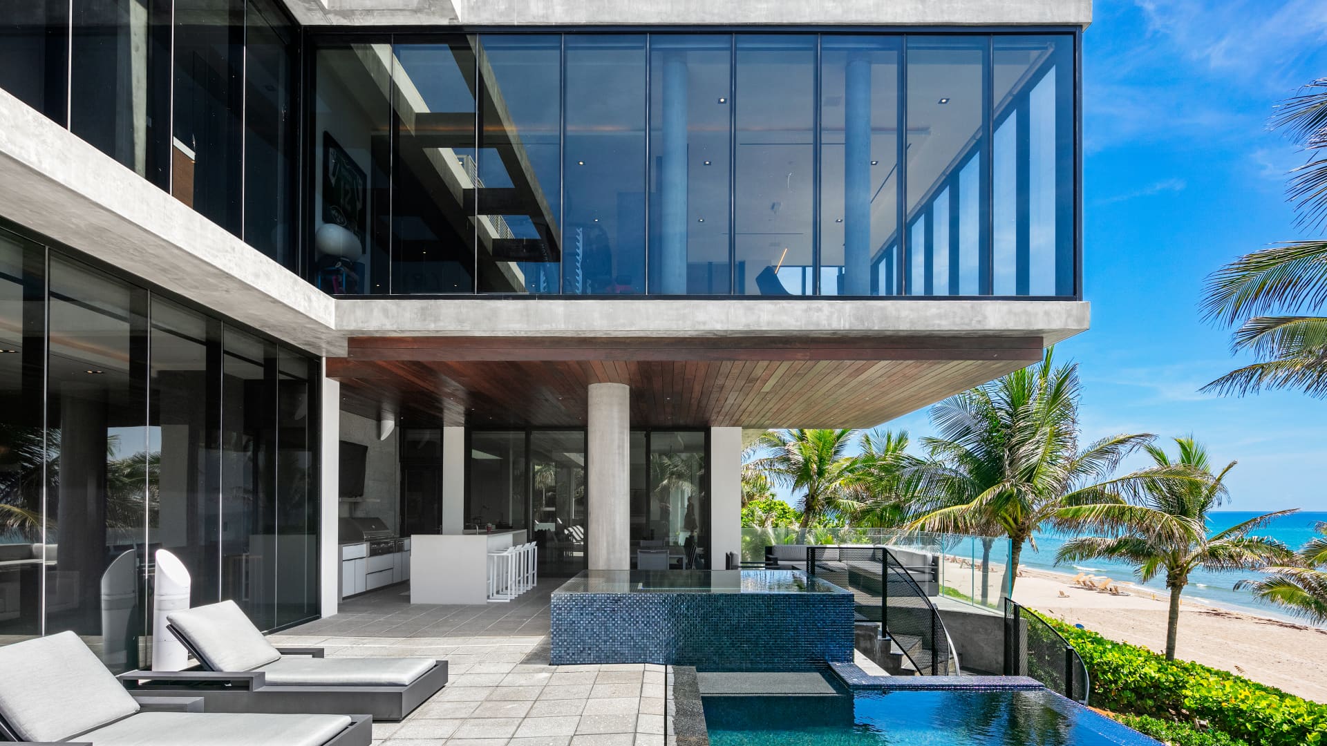 The third floor of the residence includes a cantilevered home office that overlooks the infinity pool and ocean.