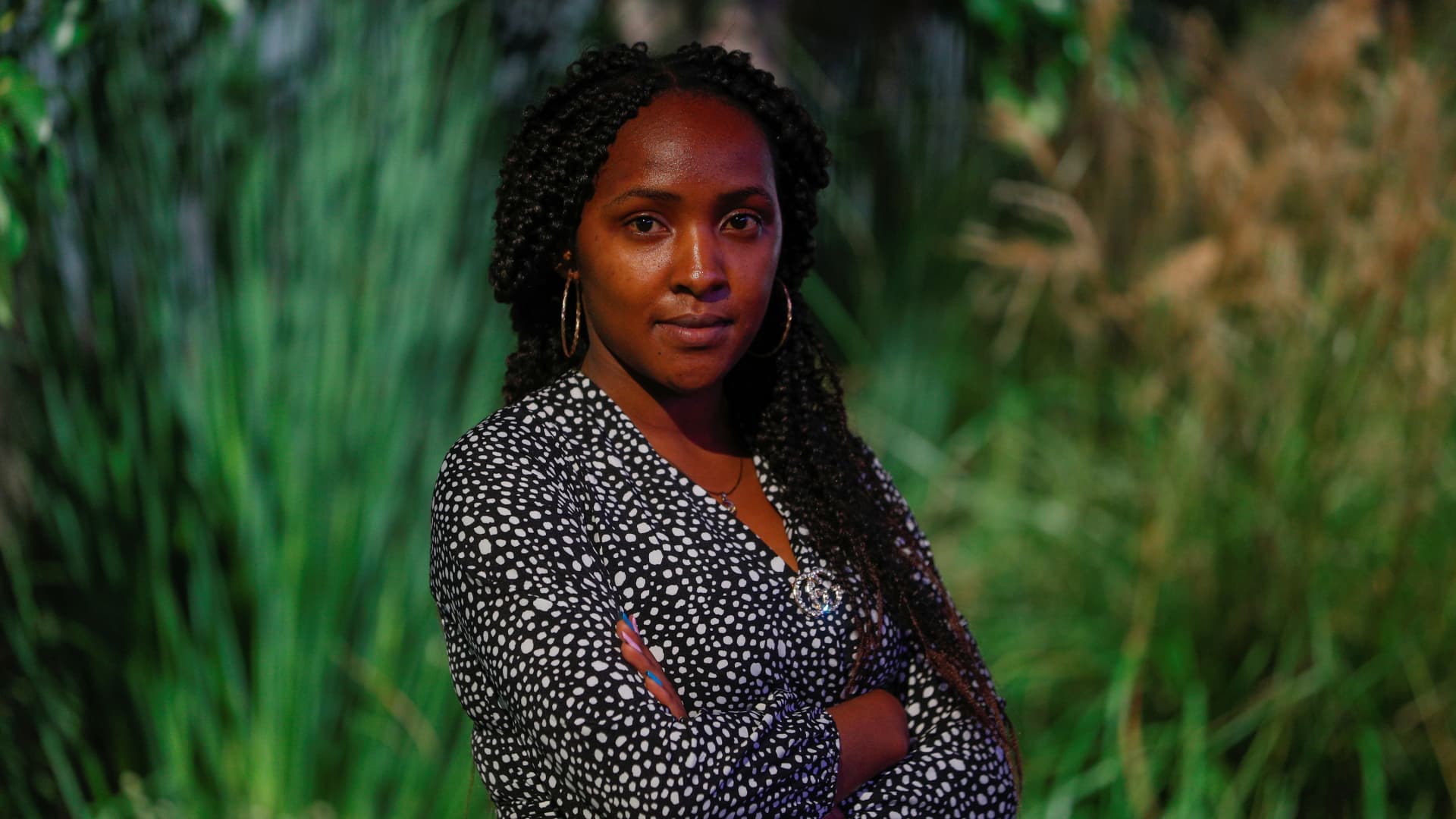 Climate activist Elizabeth Wathuti, 26, from Kenya poses for a photo during the Youth4Climate pre-COP26 conference in Milan, Italy, September 28, 2021.
