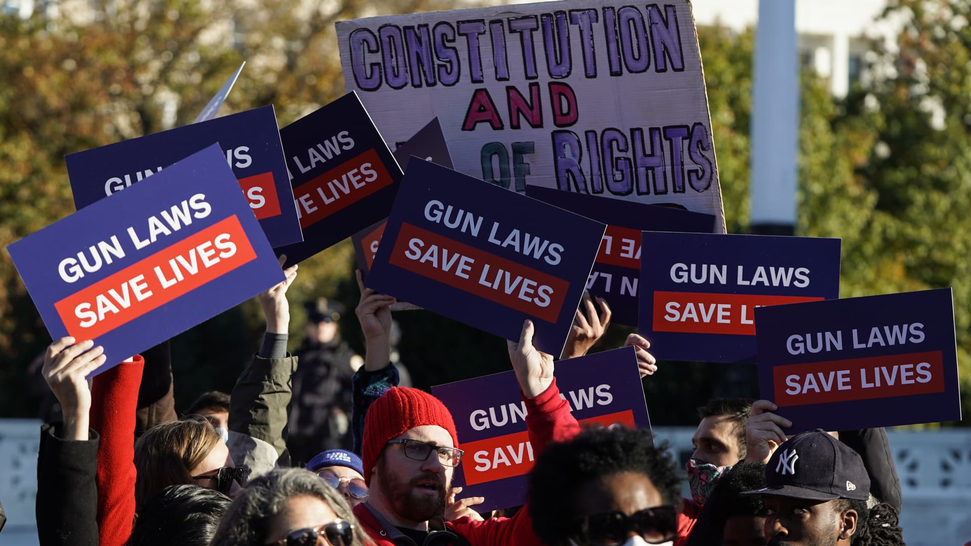 Supporters of gun control hold signs in front of supporters of gun rights during a demonstration by victims of gun violence in front of the Supreme Court as arguments begin in a major case on gun rights on November 3, 2021 in Washington, DC.