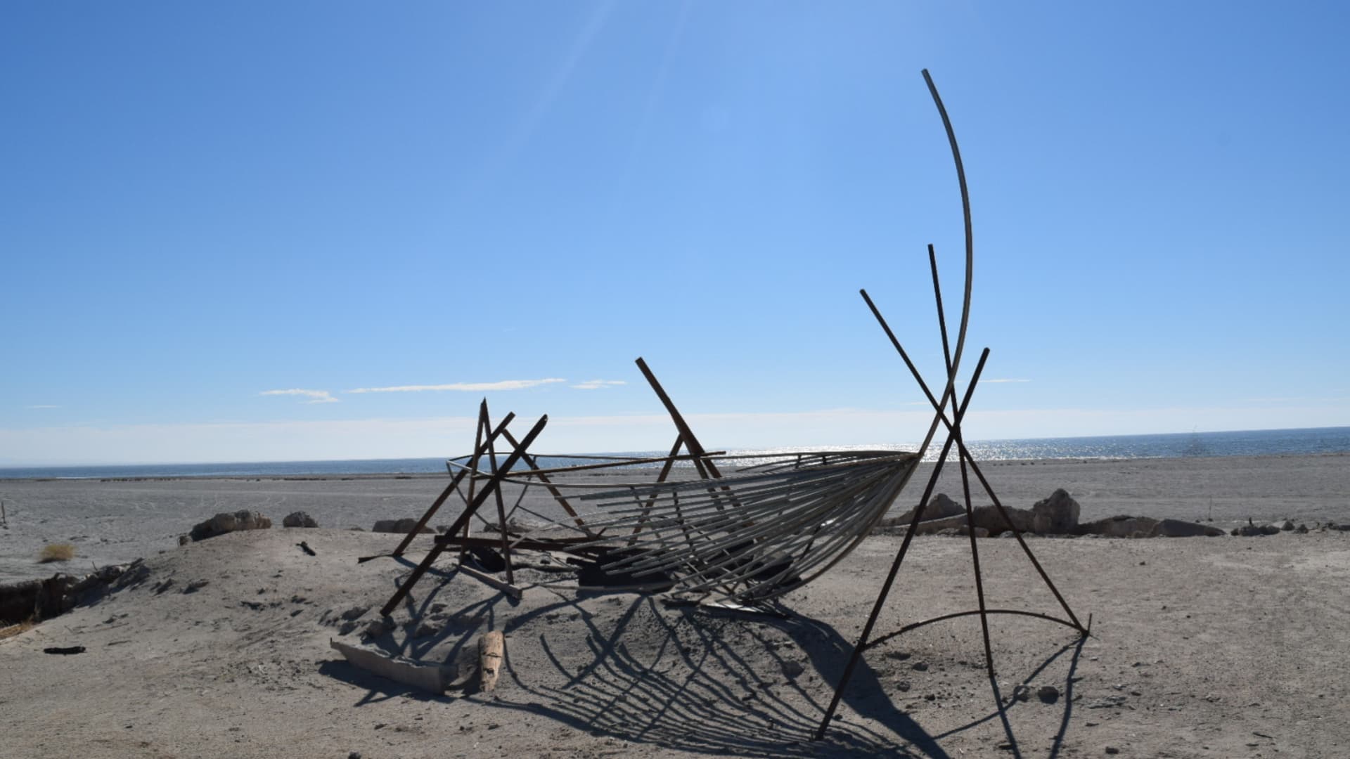 Remains of a burned boat on Bombay beach. Bombay was once a popular tourist destination, but the increasing salinity, shrinking and fumes of Salton Sea rendered it a ghost town full of bohemian-style art.