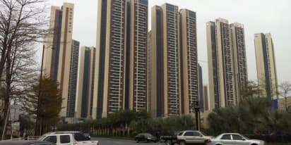 Chinese real estate developer Kaisa halts trading in Hong Kong, as debt concerns escalate