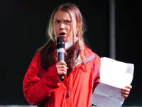 Climate activist Greta Thunberg speaking on the main stage in George Square as part of the Fridays for Future Scotland march during the Cop26 summit in Glasgow. Picture date: Friday November 5, 2021.
