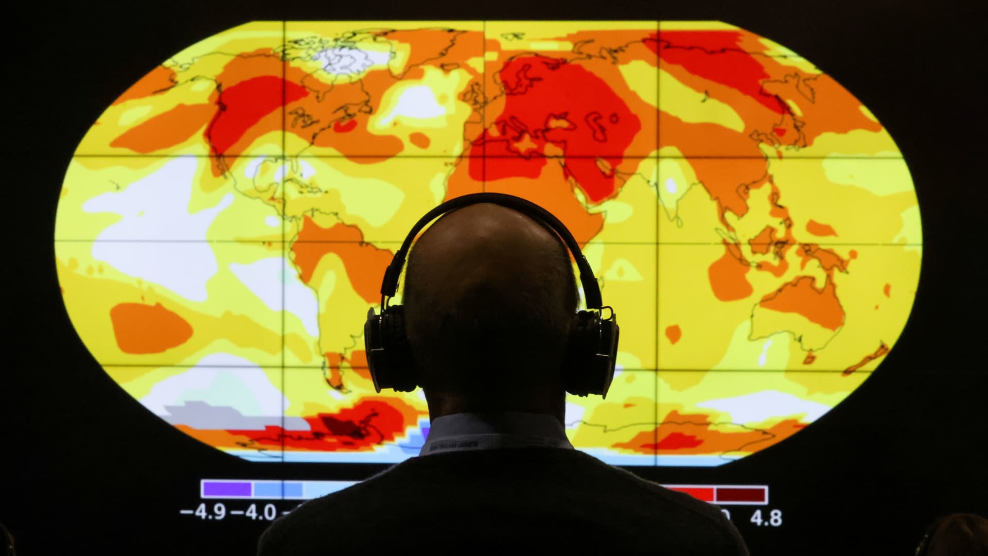 A delegate looks at a screen during the UN Climate Change Conference (COP26) in Glasgow, Scotland, Britain, November 8, 2021.