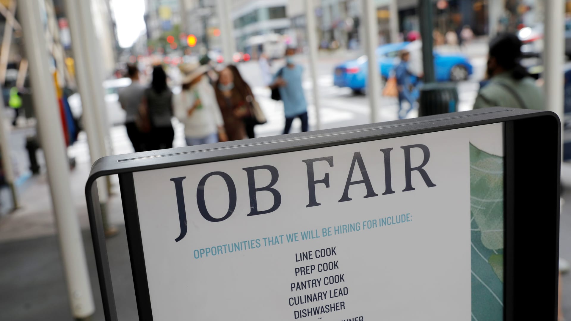 Signage for a job fair is seen on 5th Avenue after the release of the jobs report in New York, September 3, 2021.
