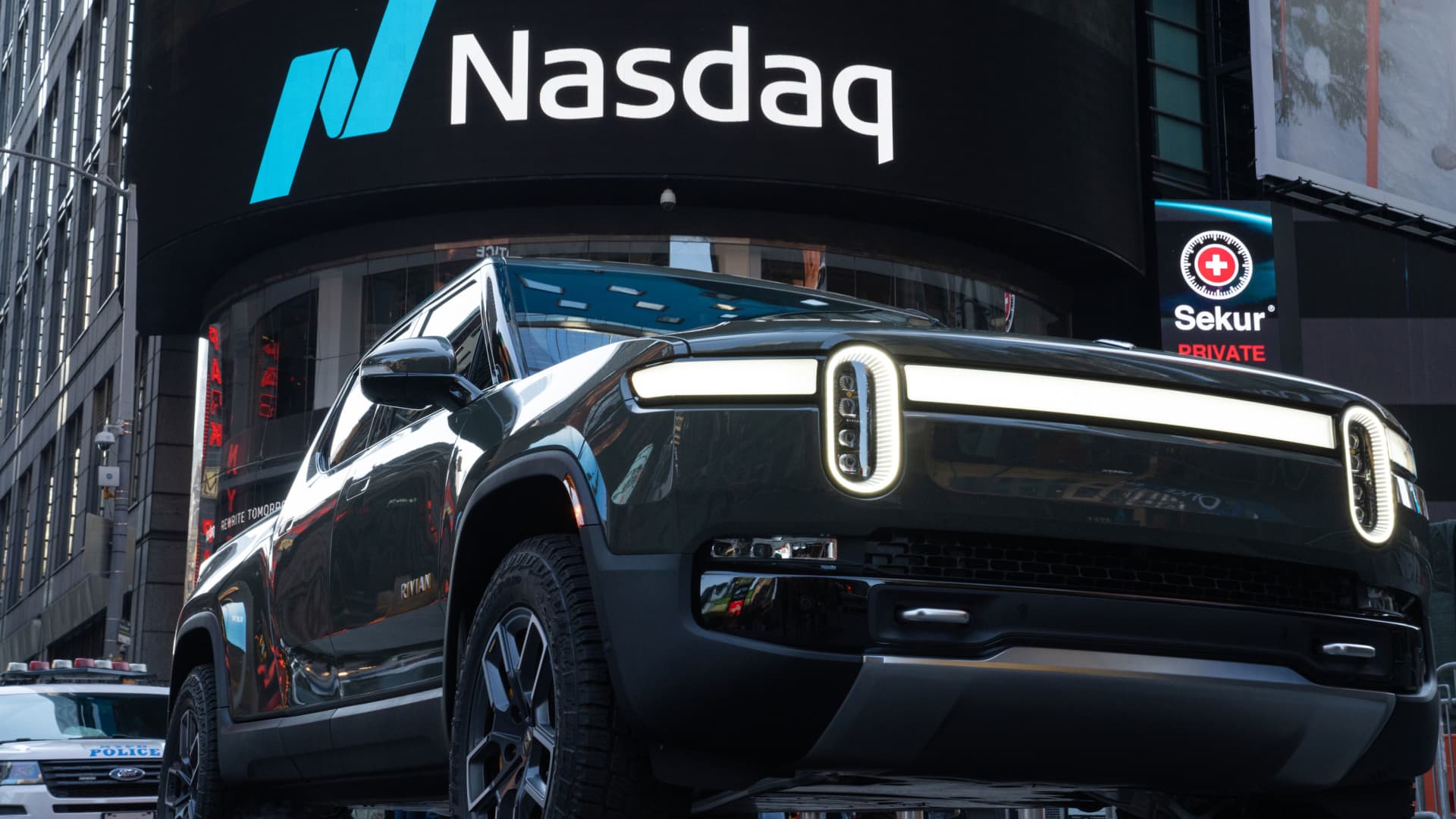 A Rivian R1T electric pickup truck during the company's IPO outside the Nasdaq MarketSite in New York, on Wednesday, Nov. 10, 2021.