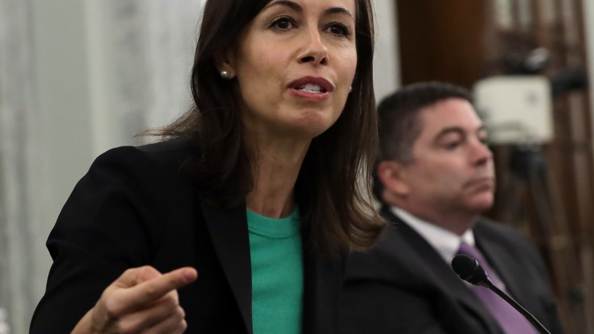 Commissioner of Federal Communications Commission Jessica Rosenworcel (L) speaks as commissioner of Federal Communications Commission Michael O'Rielly (R) listens during an oversight hearing to examine the Federal Communications Commission on June 24, 2020 in Washington, DC.