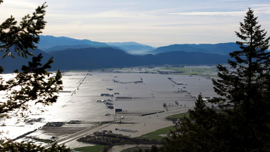 Flooded houses and farms are seen from the top of Sumas Mountain after rainstorms caused flooding and landslides in Abbotsford, British Columbia, Canada November 17, 2021. REUTERS/Jesse Winter
