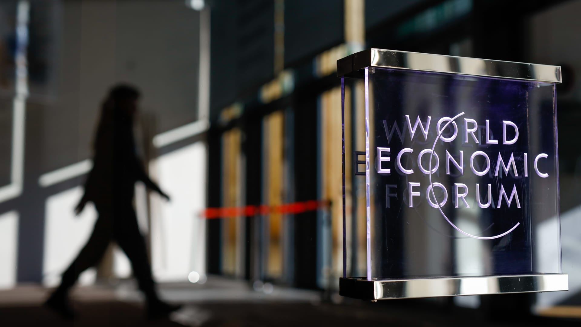 A logo sits on a window at the entrance hall of the Congress Center ahead of the World Economic Forum (WEF) in Davos, Switzerland, on Monday, Jan. 20, 2020.