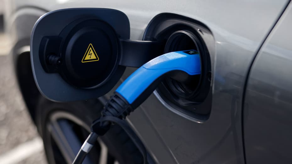 A charging cable plugged into a Volvo electric vehicle in London on November 18, 2020.