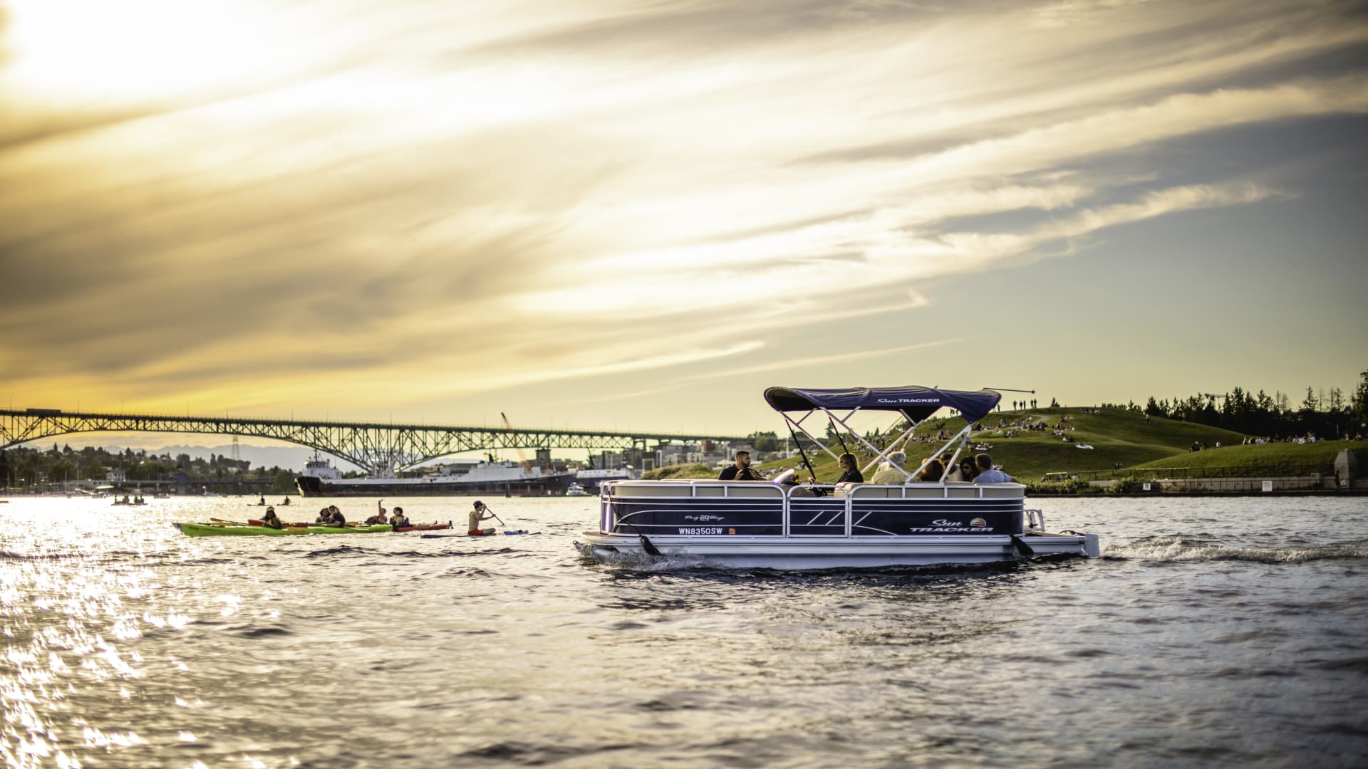 This pontoon is powered by a Pure Watercraft fully electric outboard motor.