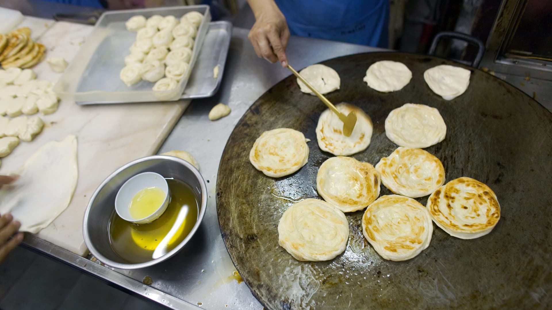 Roti Mataba serves buttery, fried roti flatbread, which comes stuffed, served with curry or slathered with sweetened condensed milk and sugar.