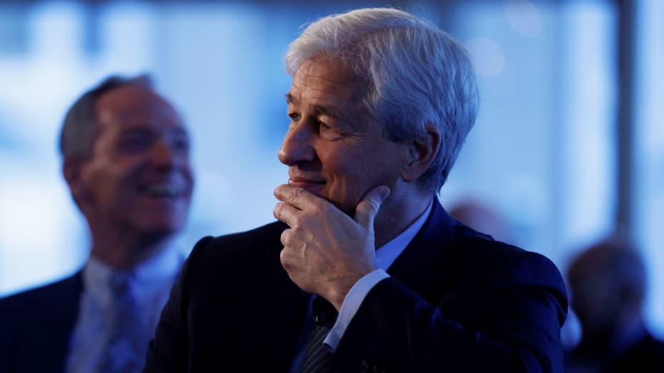 JP Morgan CEO Jamie Dimon listens as he is introduced at the Boston College Chief Executives Club luncheon in Boston, Massachusetts, U.S., November 23, 2021.