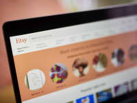 The Etsy website displayed on a laptop.