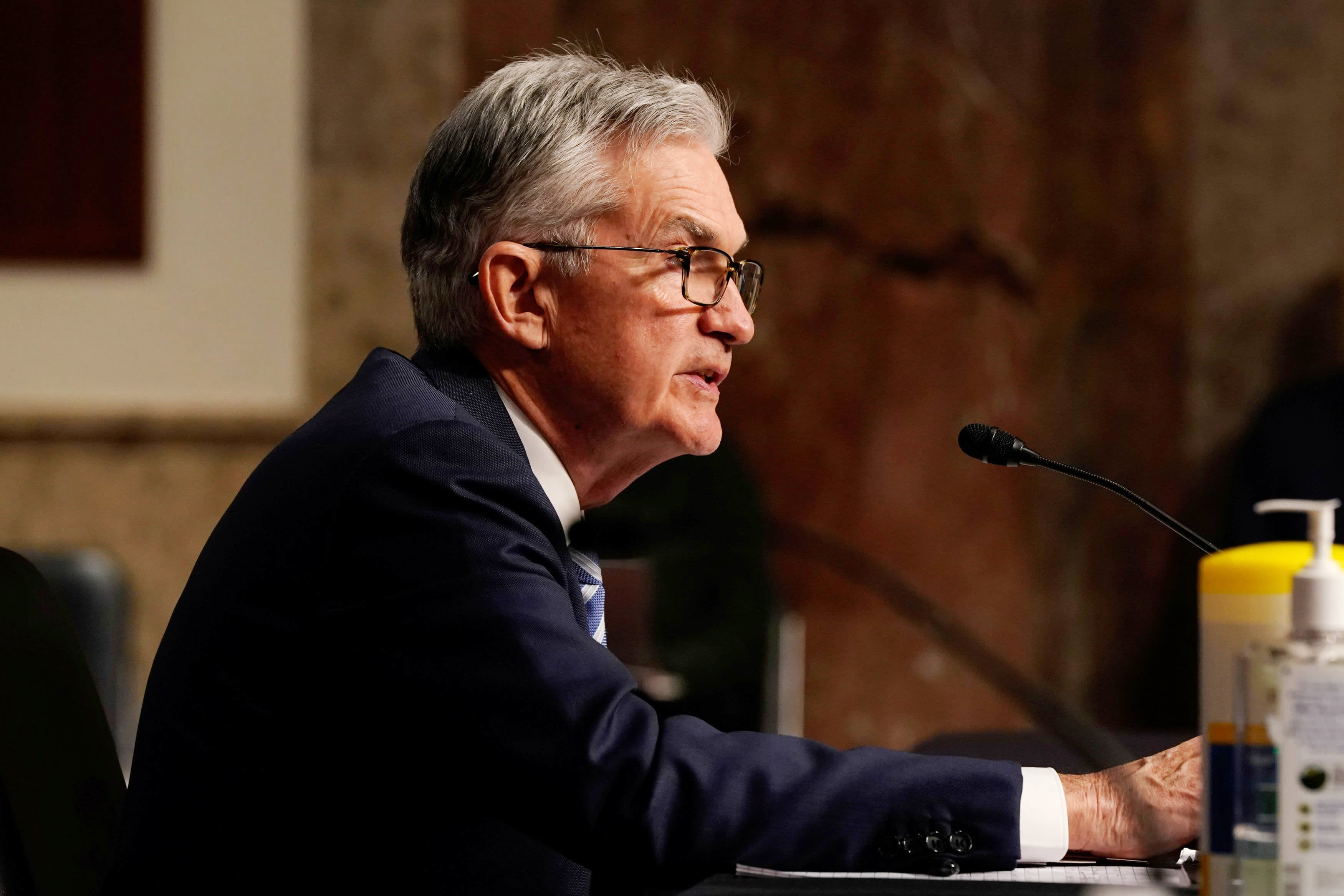 Powell says Fed will discuss speeding up bond-buying taper at December meeting