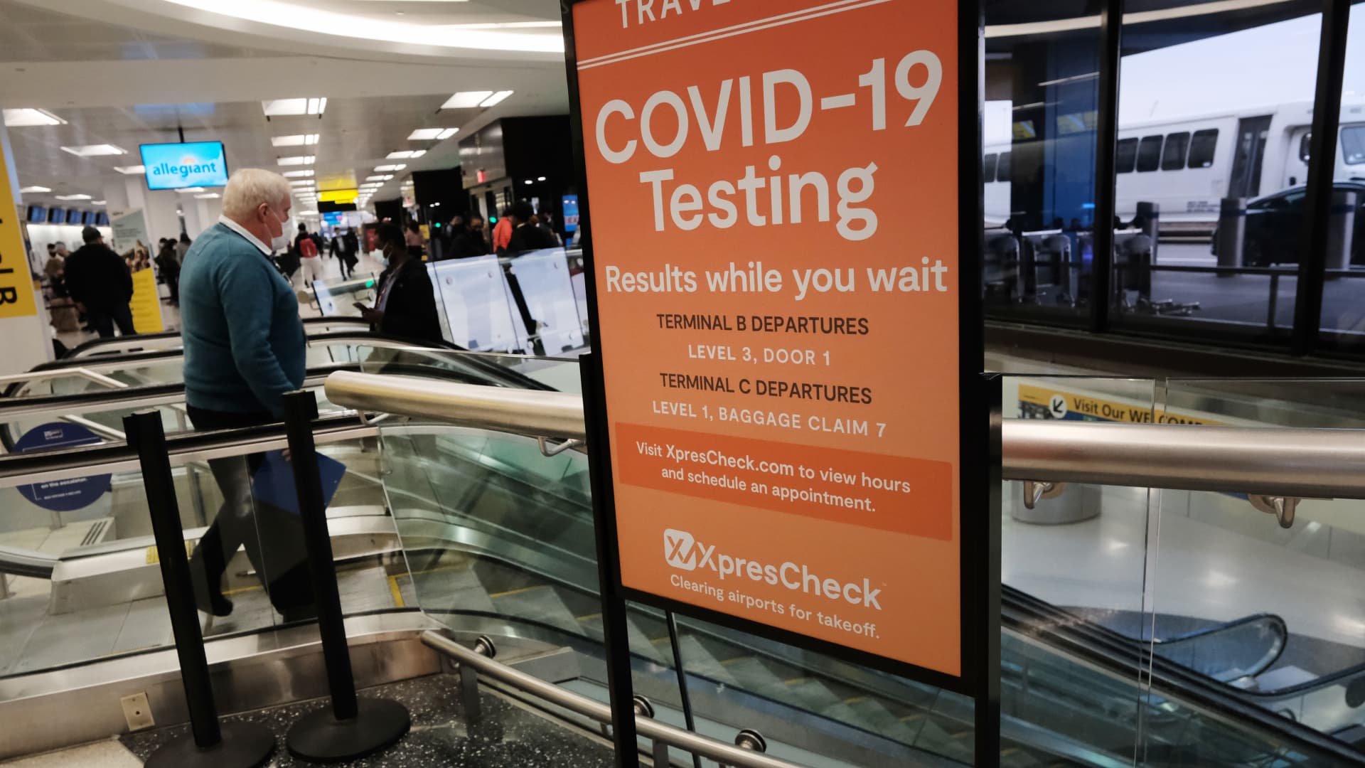 A COVID-19 testing facility is advertised at Newark Liberty International Airport on November 30, 2021 in Newark, New Jersey.