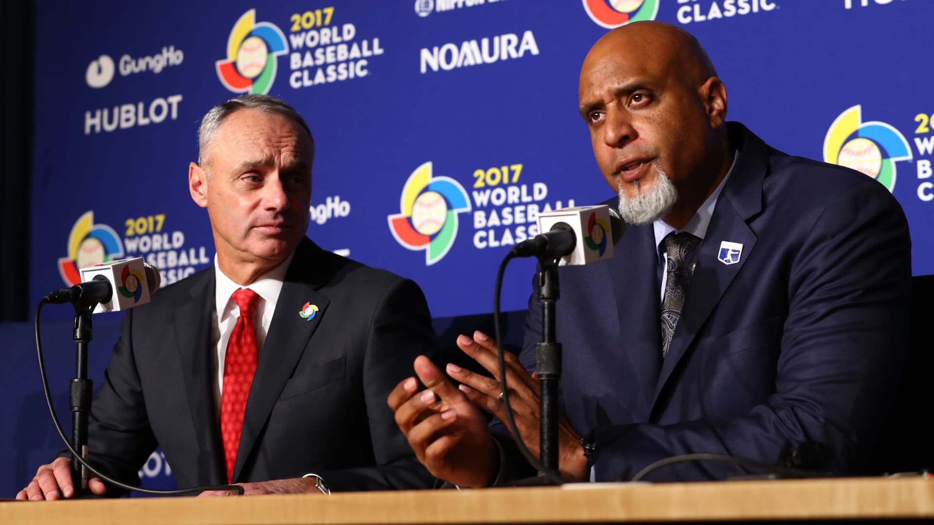 Major League Baseball Commissioner Robert D. Manfred Jr. and Major League Baseball Players Association Executive Director Tony Clark speak during a press conference before Game 3 of the Championship Round of the 2017 World Baseball Classic between Team USA and Team Puerto Rico on Wednesday, March 22, 2017 at Dodger Stadium in Los Angeles, California.