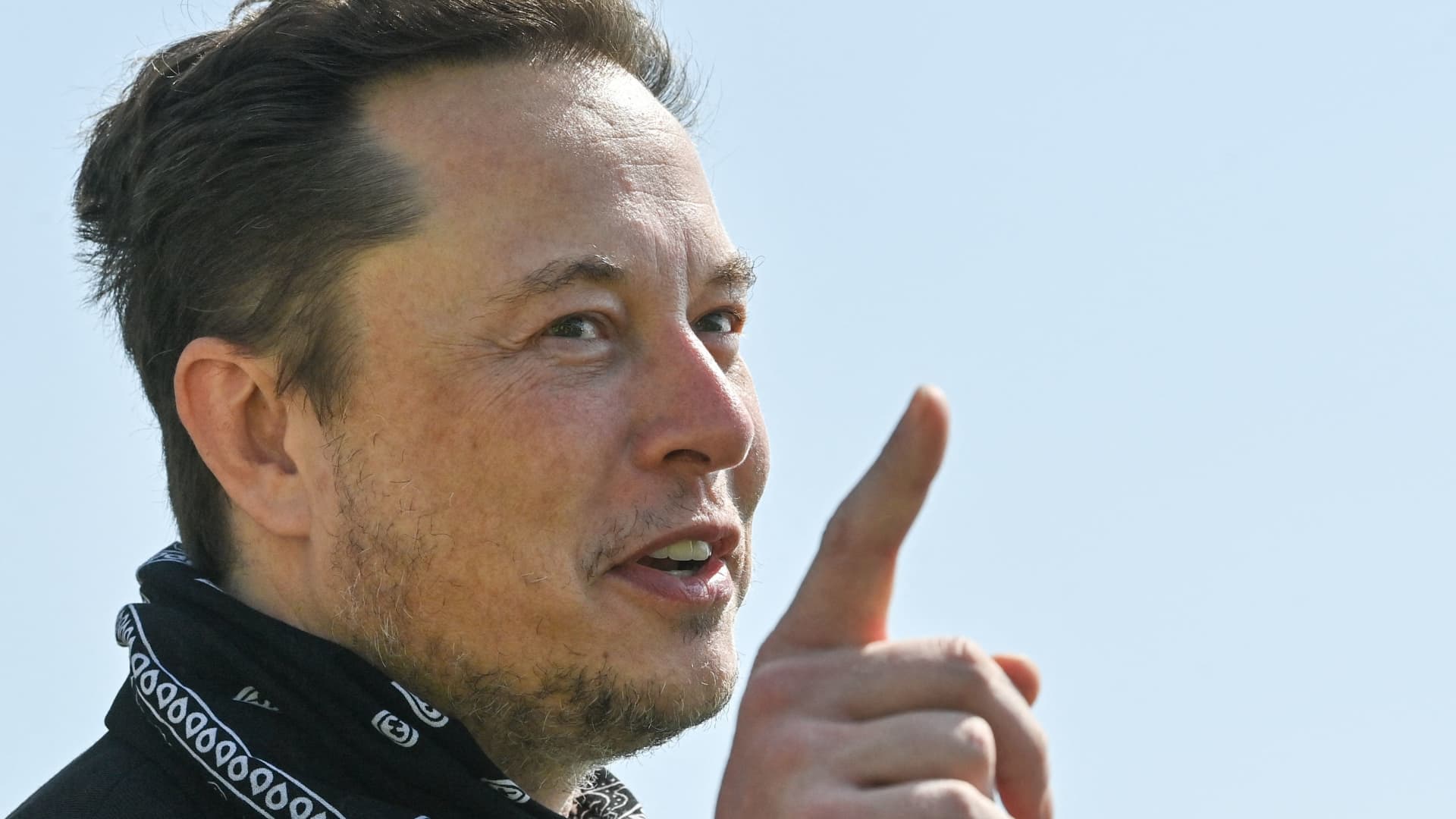 Entrepreneur and business magnate Elon Musk gestures during a visit at the Tesla Gigafactory plant under construction, on August 13, 2021 in Gruenheide near Berlin, eastern Germany.