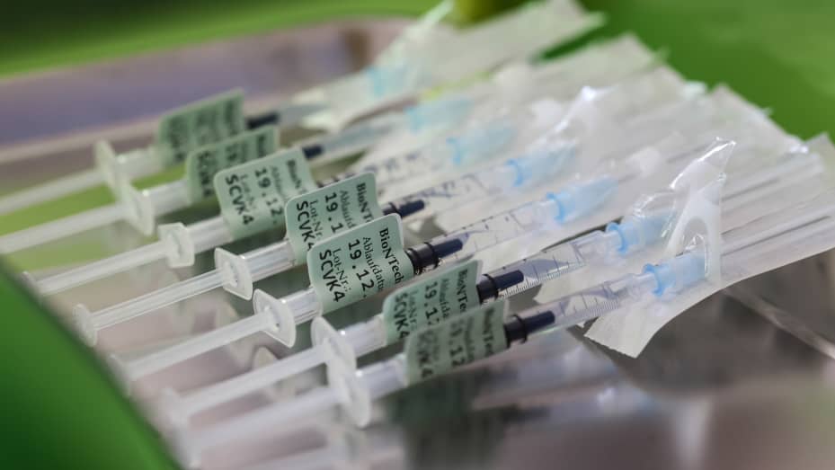 Syringes prepared with the Pfizer-BioNTech vaccine for Covid-19 at a vaccination center on Thursday, Dec. 2, 2021.