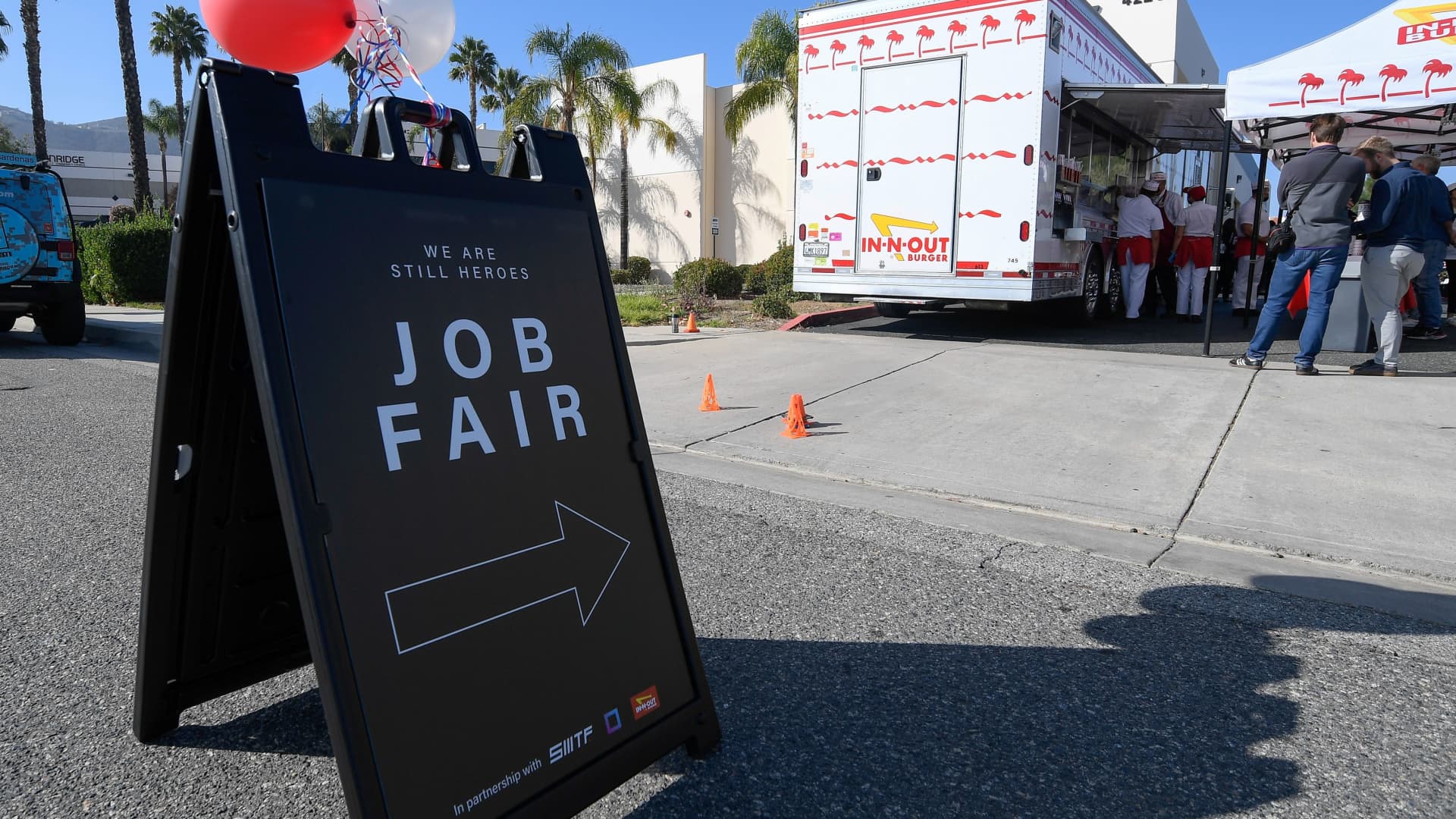 A sign sits in front of a job fair for employees who are not vaccinated against the coronavirus disease (COVID-19) in Temecula, California, U.S., December 4, 2021.