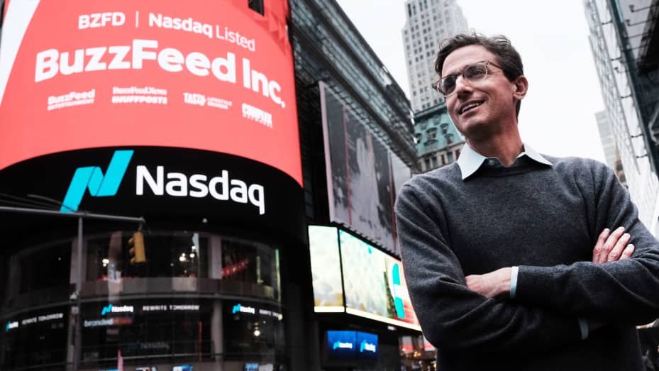 BuzzFeed CEO Jonah Peretti stands in front of the Nasdaq market site in Times Square as the company goes public through a merger with a special-purpose acquisition company on December 06, 2021 in New York City.