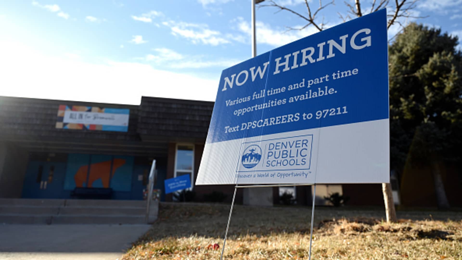 Now Hiring sign of Denver Public School placed in front of Bromwell Elementary School in Denver, Colorado on Tuesday, December 7, 2021.