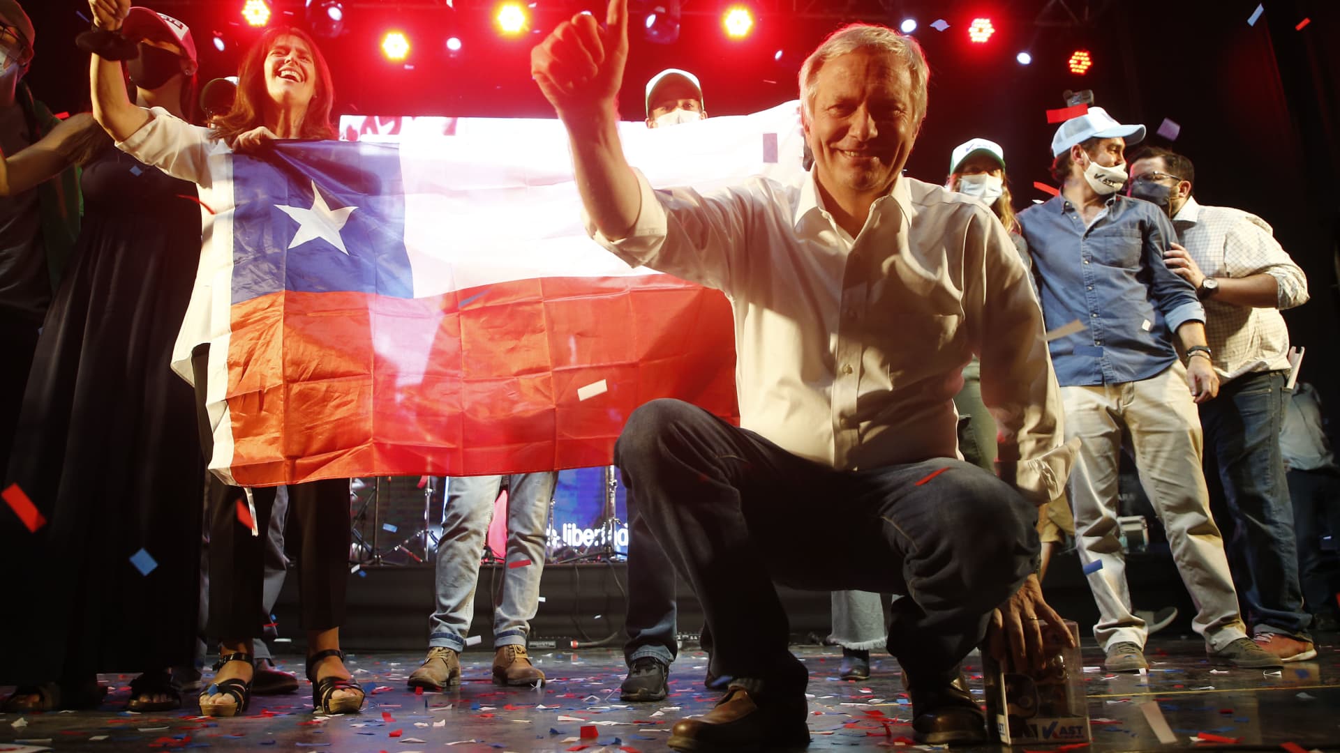Chilean presidential candidate Jose Antonio Kast of the Republican Party greets supporters during the presidential elections campaign closing rally on November 18, 2021 in Santiago, Chile.