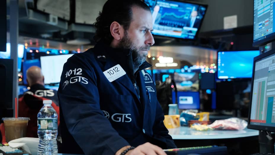 Traders work on the floor of the New York Stock Exchange (NYSE) on December 08, 2021 in New York City.