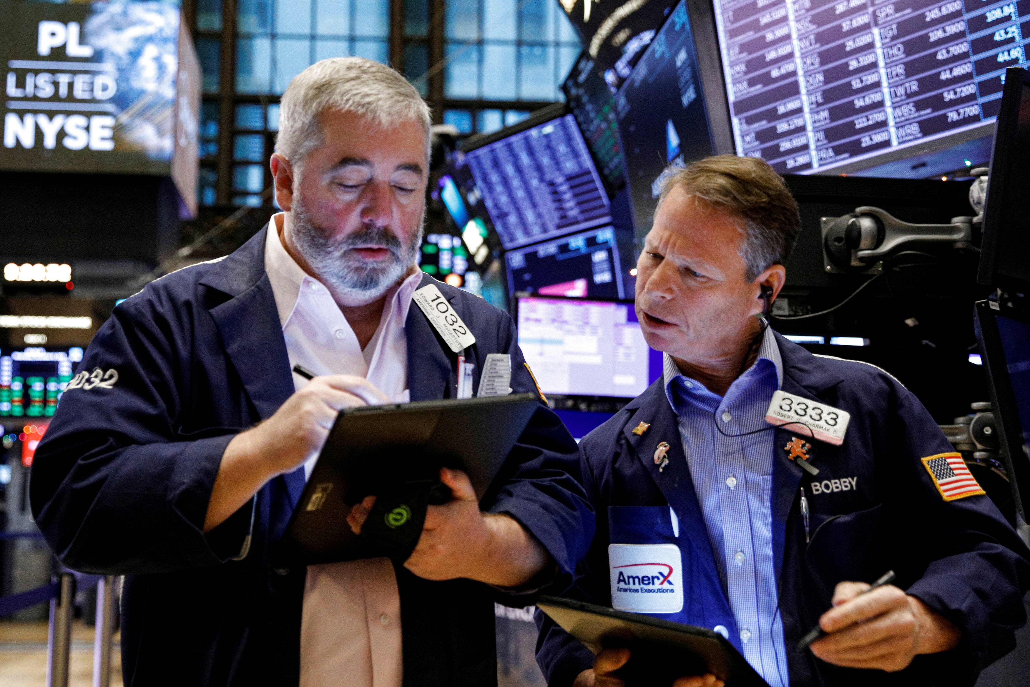 Dow falls more than 300 points as bank stocks struggle after earnings, JPMorgan slides 6%