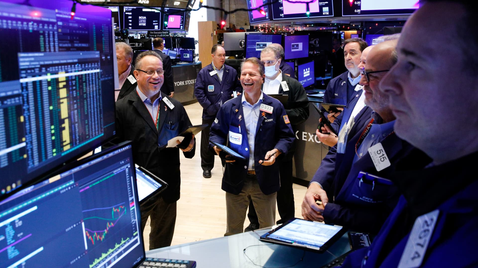Traders work on the floor of the New York Stock Exchange (NYSE) in New York City, U.S., December 9, 2021.