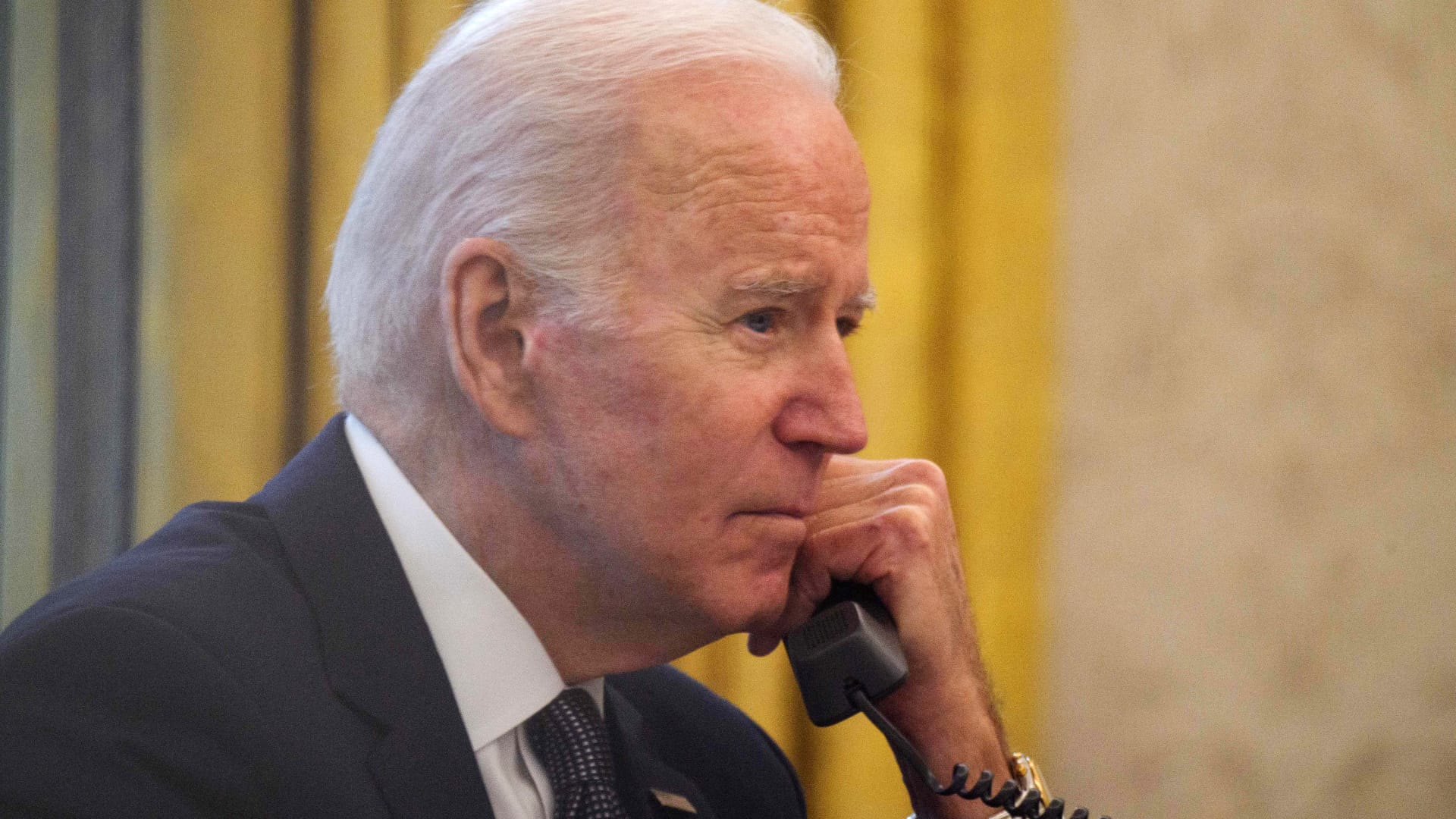US President Joe Biden speaks on the phone to his Ukrainian counterpart Volodymyr Zelensky in the Oval Office at the White House in Washington, DC, on December 9, 2021.
