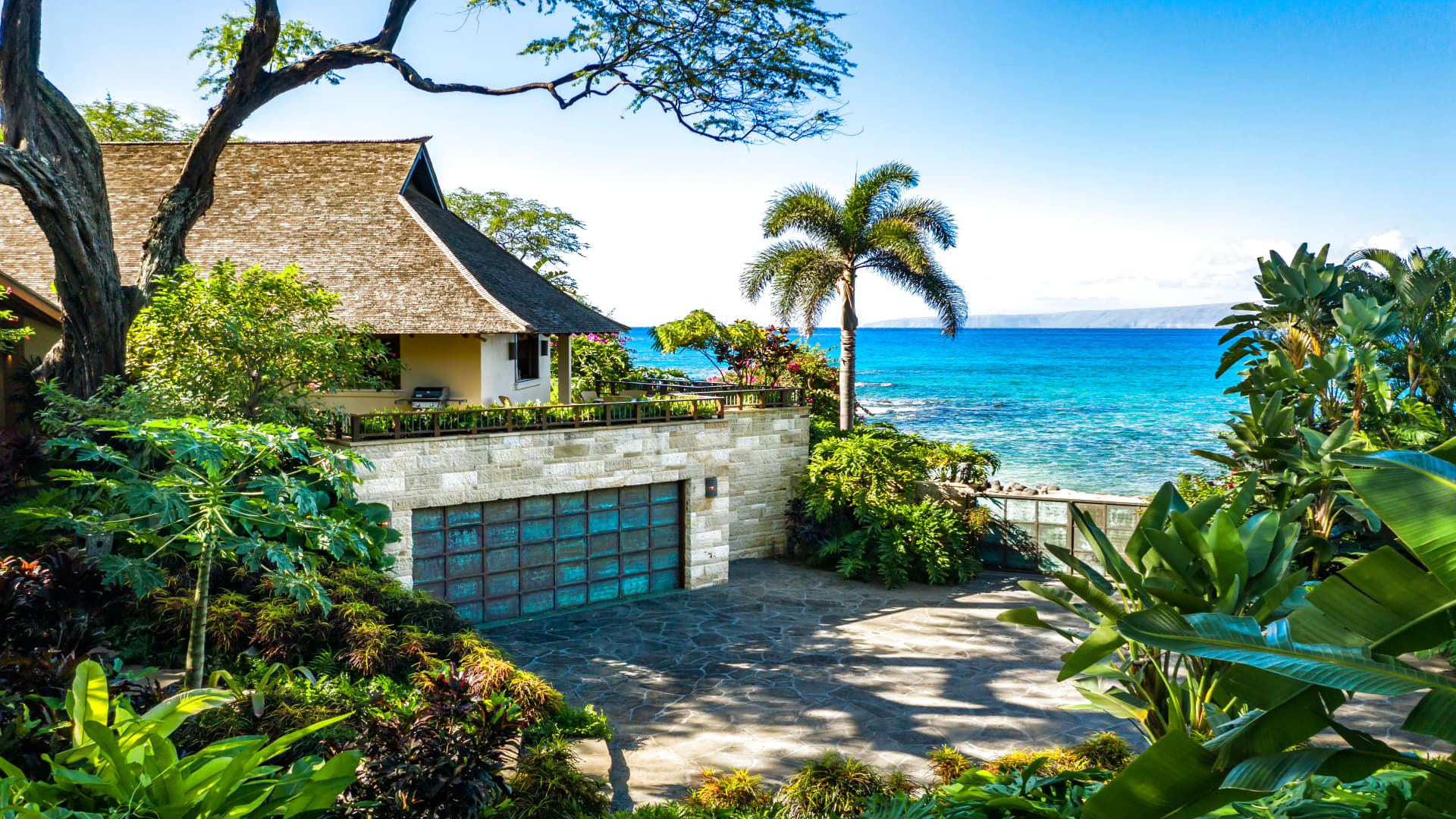 This mansion in Maui has five bedrooms, five and a half baths, and an ocean view. It recently sold for $12.5 million.