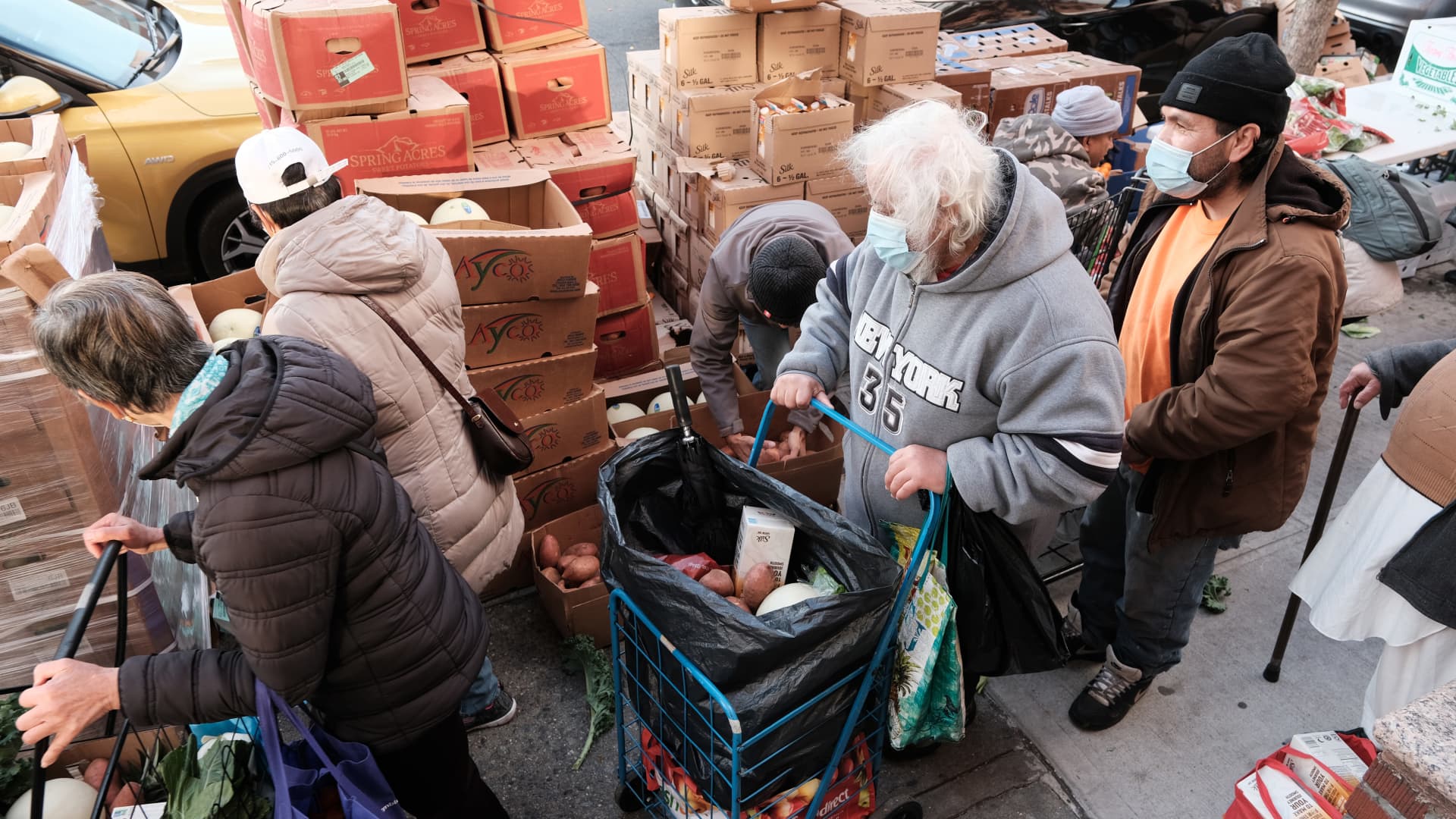 Free food is handed out by the Brooklyn community organization PASWO during a weekly food distribution on December 08, 2021 in New York City.