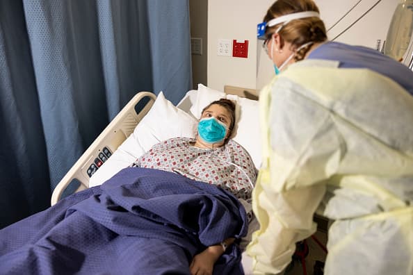 Covid: Delta drives surge of U.S. hospitalizations amid omicron fears