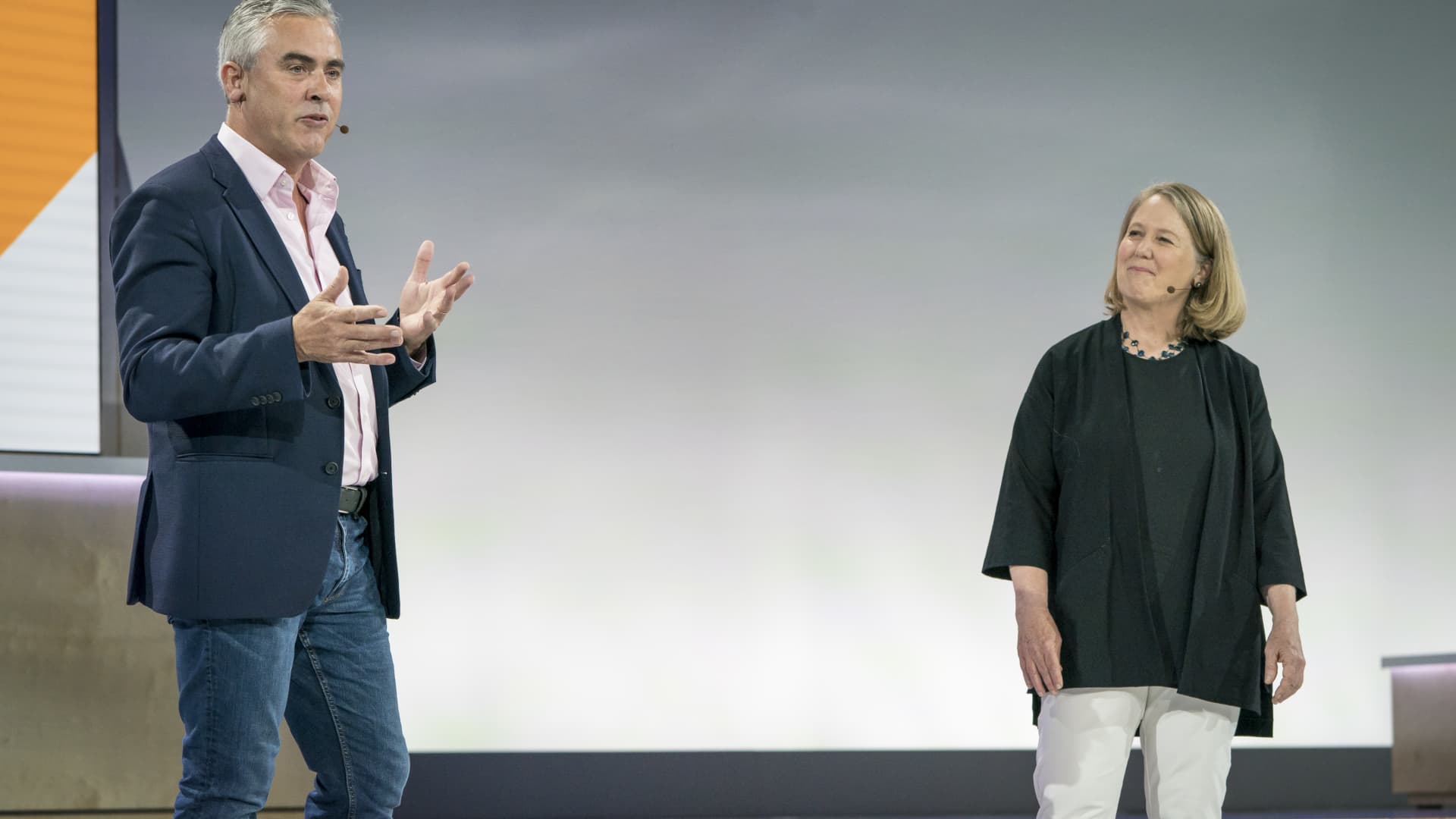 Mike McNamara, chief information officer at Target, left, speaks as Diane Greene, then CEO of cloud services at Google, listens during the Google Cloud Next event in San Francisco on July 24, 2018.