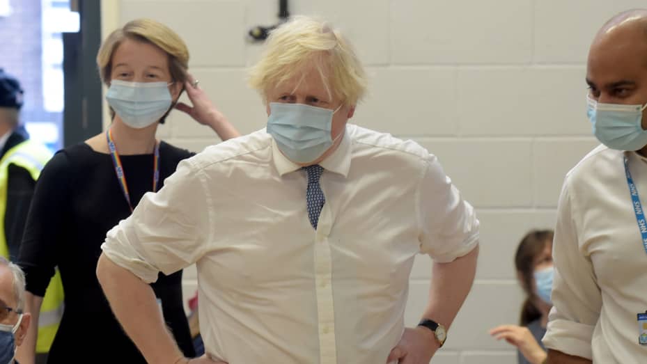 British Prime Minister Boris Johnson visits Stow Health Vaccination centre in Westminster on December 13, 2021 in London, England.
