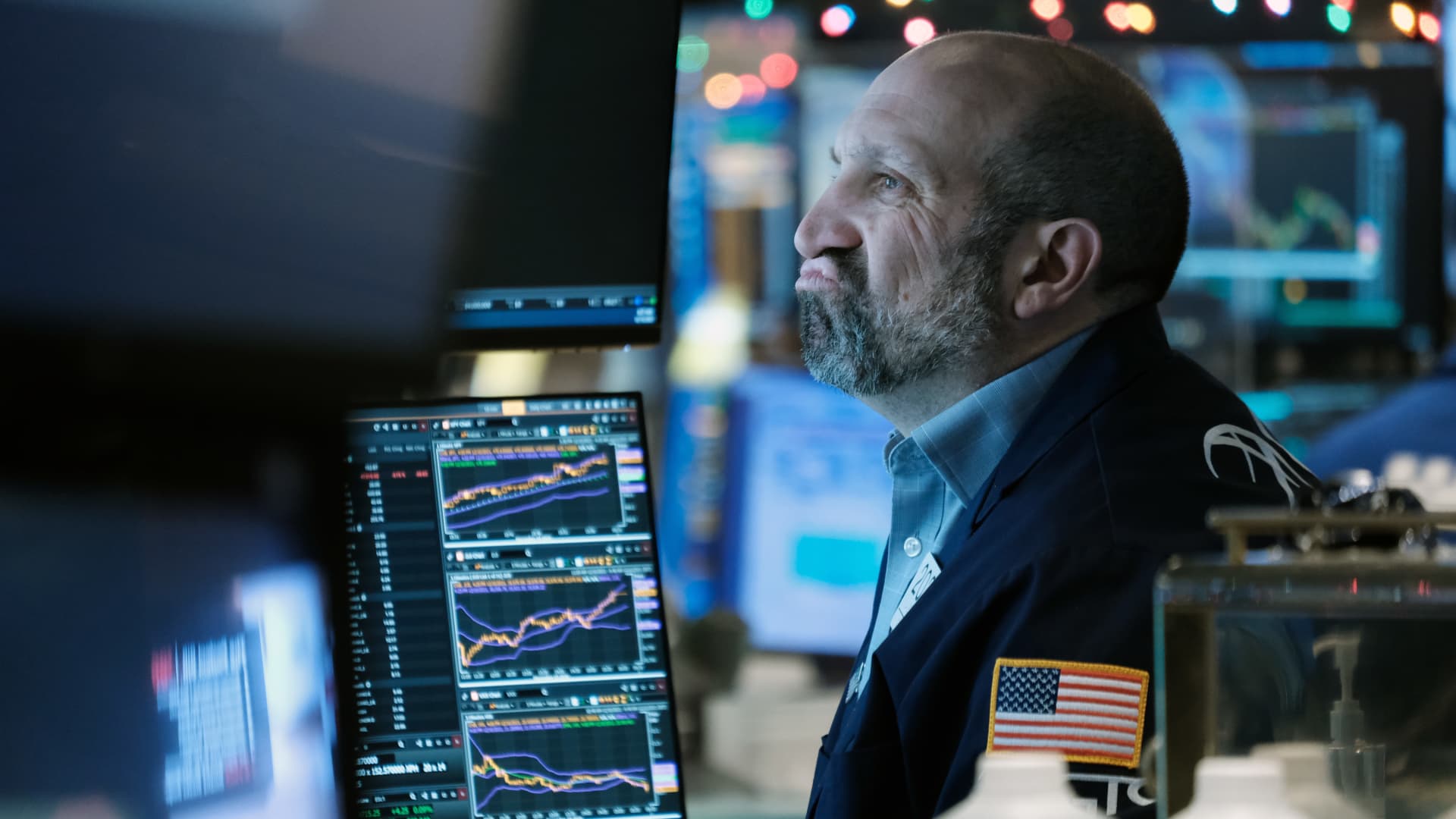 A trader works on the floor of the New York Stock Exchange (NYSE) on December 13, 2021 in New York City.