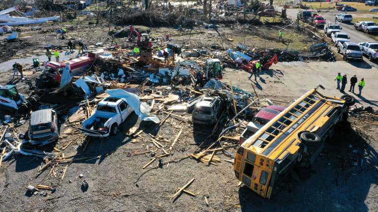 At least 64 people die in Kentucky after devastating tornadoes sweep through the area