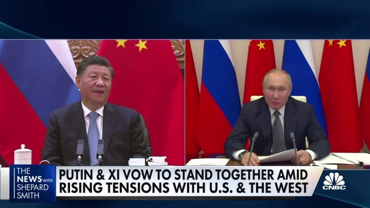 Putin and Xi hold a virtual summit, vow to stand together against West