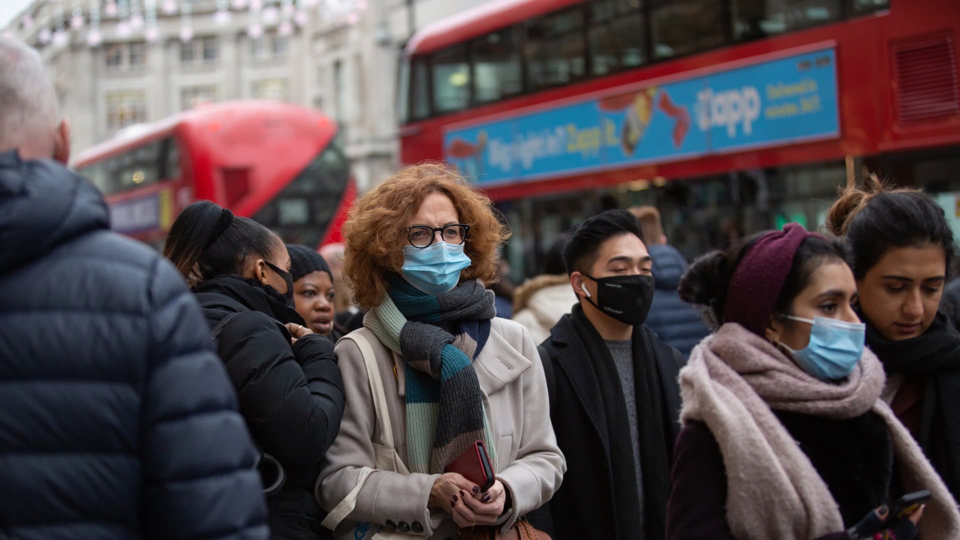 Shoppers wearing face masks as a preventive measure against the spread of Covid-19 seen walking along Oxford Circus in London.