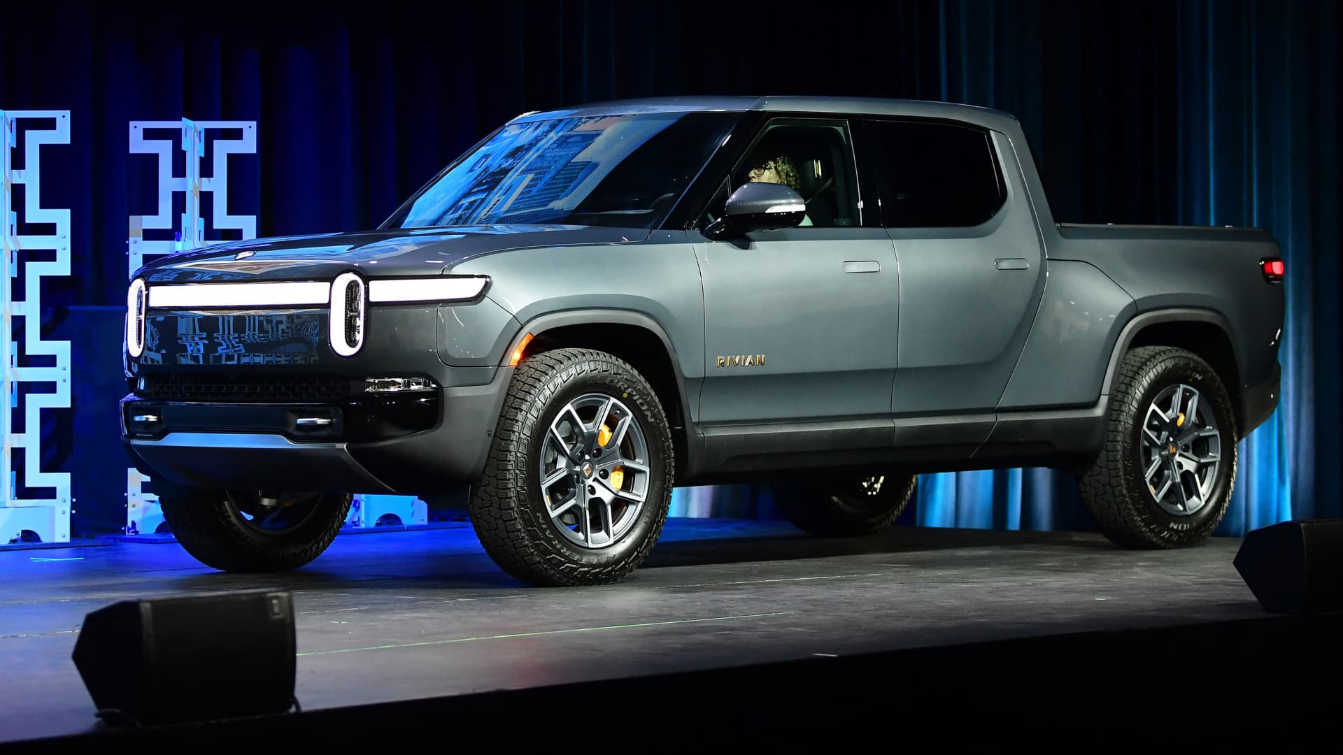 The Rivian R1T on stage as a 2022 Truck of the Year Finalist at the LA Auto Show in Los Angeles, California on November 17, 2021.