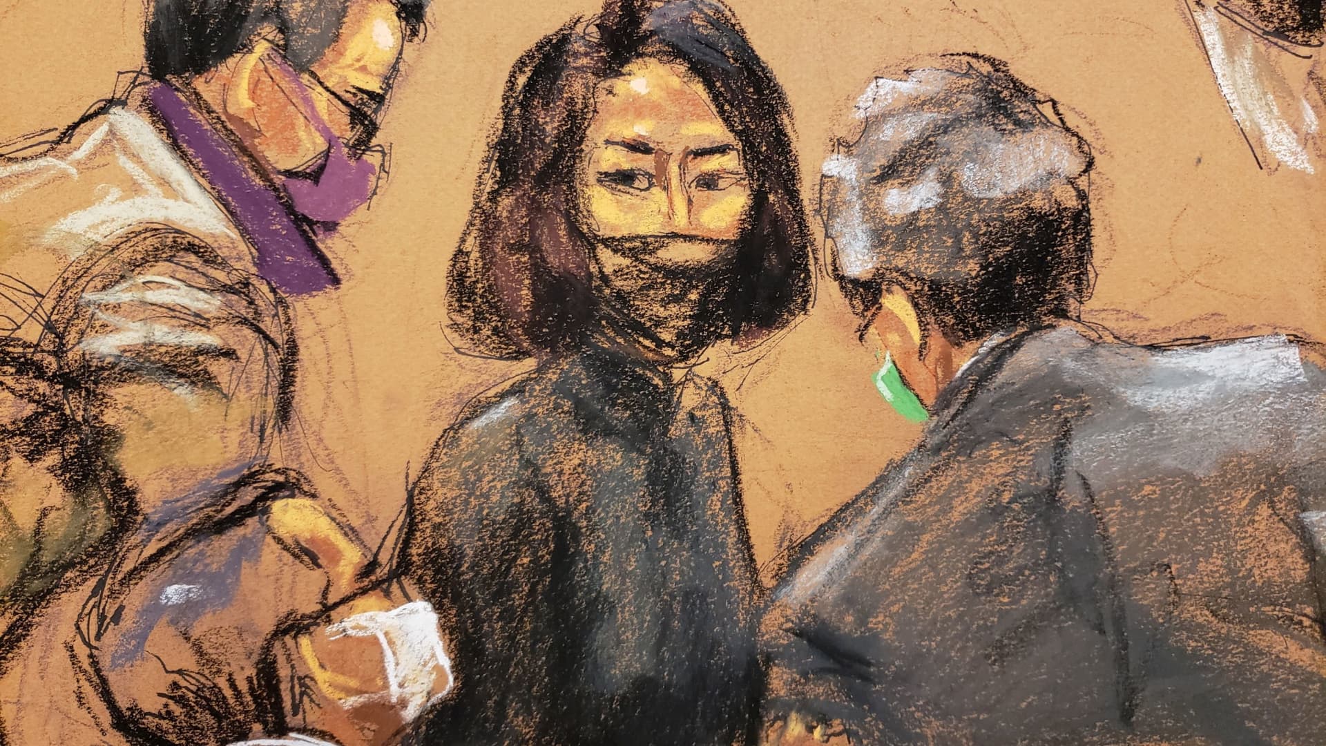 Ghislaine Maxwell speaks with her attorneys during the trial of Maxwell, the Jeffrey Epstein associate accused of sex trafficking, in a courtroom sketch in New York City, December 17, 2021.