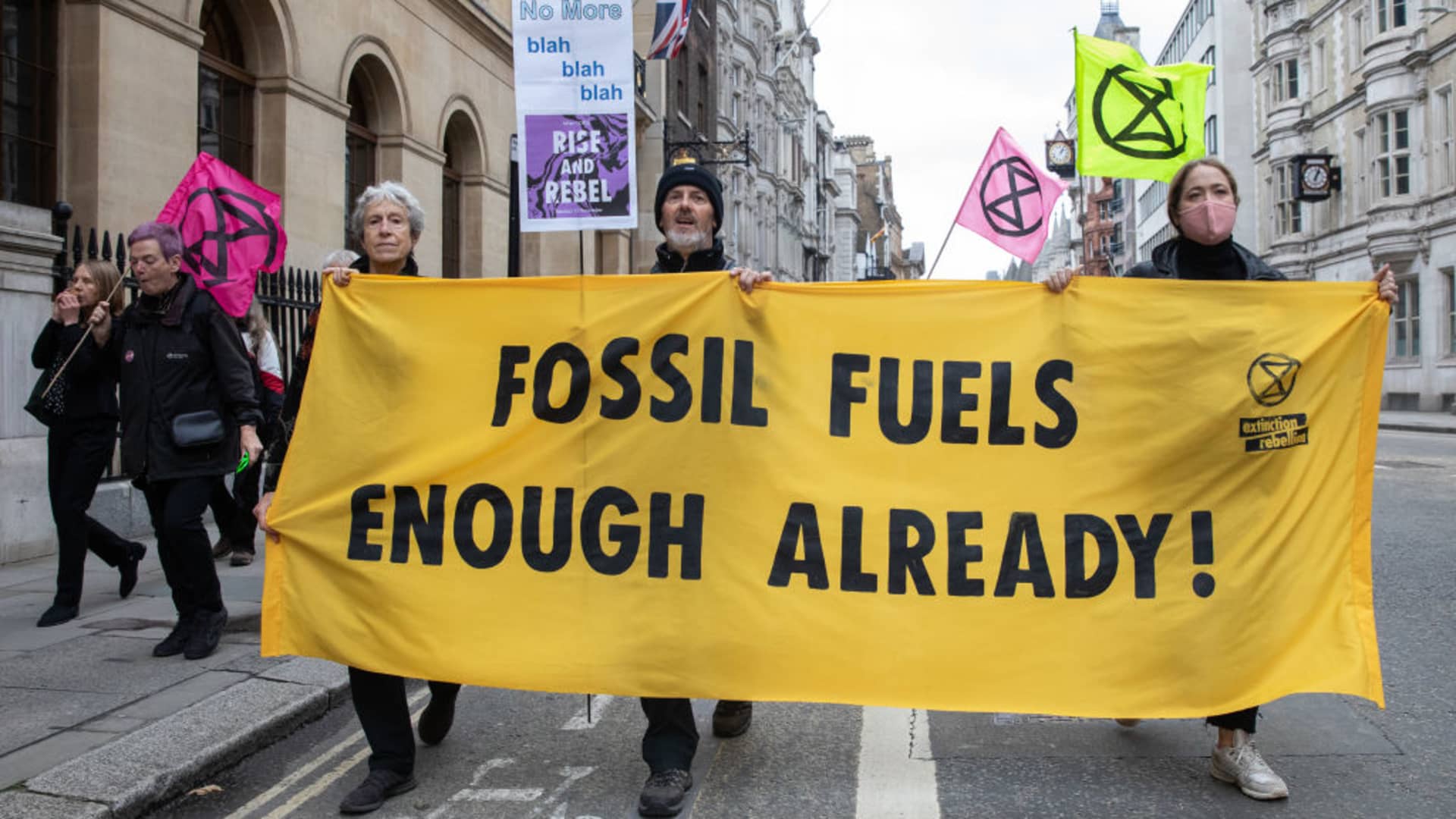 Extinction Rebellion climate activists take part in a Rise and Rebel march organised to coincide with the end of, and anticipated failure of, the COP26 climate summit on 13th November 2021 in London, United Kingdom.