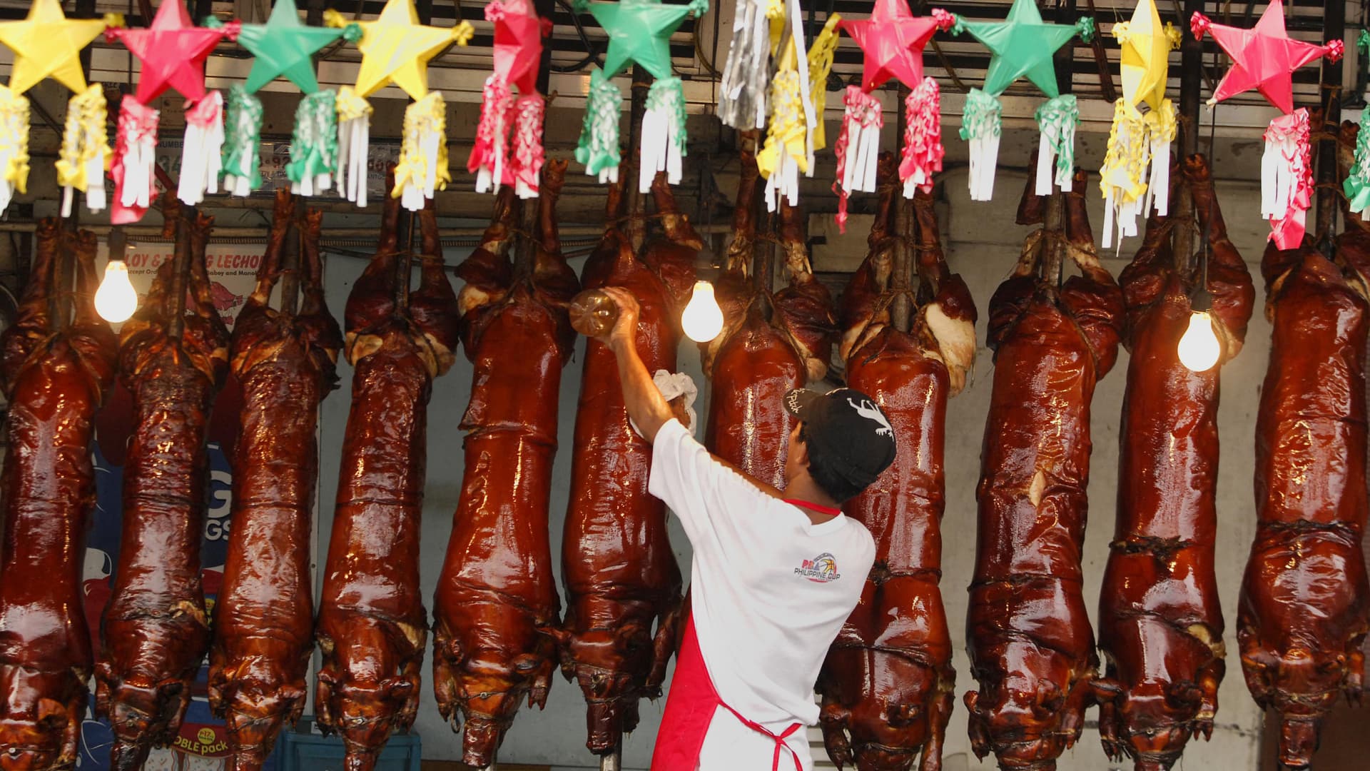 For many Filipino families, Christmas is incomplete without lechon, a whole crispy-skinned roasted pig.